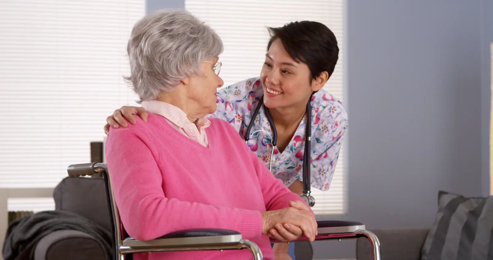 Personalized Surgery Plans. Chinese-nurse-talking-with-Senior-patient